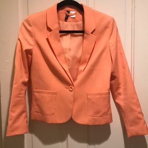 Coral colored business jacket